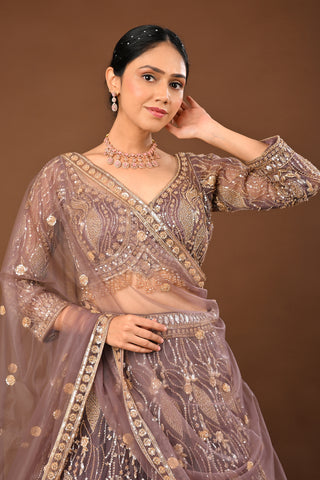MAUVE Lehenga in Soft Net featuring Cutdana, Tubelight and Sequins
