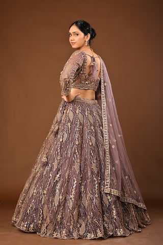 MAUVE Lehenga in Soft Net featuring Cutdana, Tubelight and Sequins